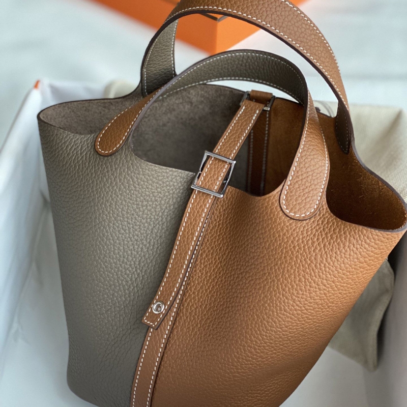 H**mes shopping bags